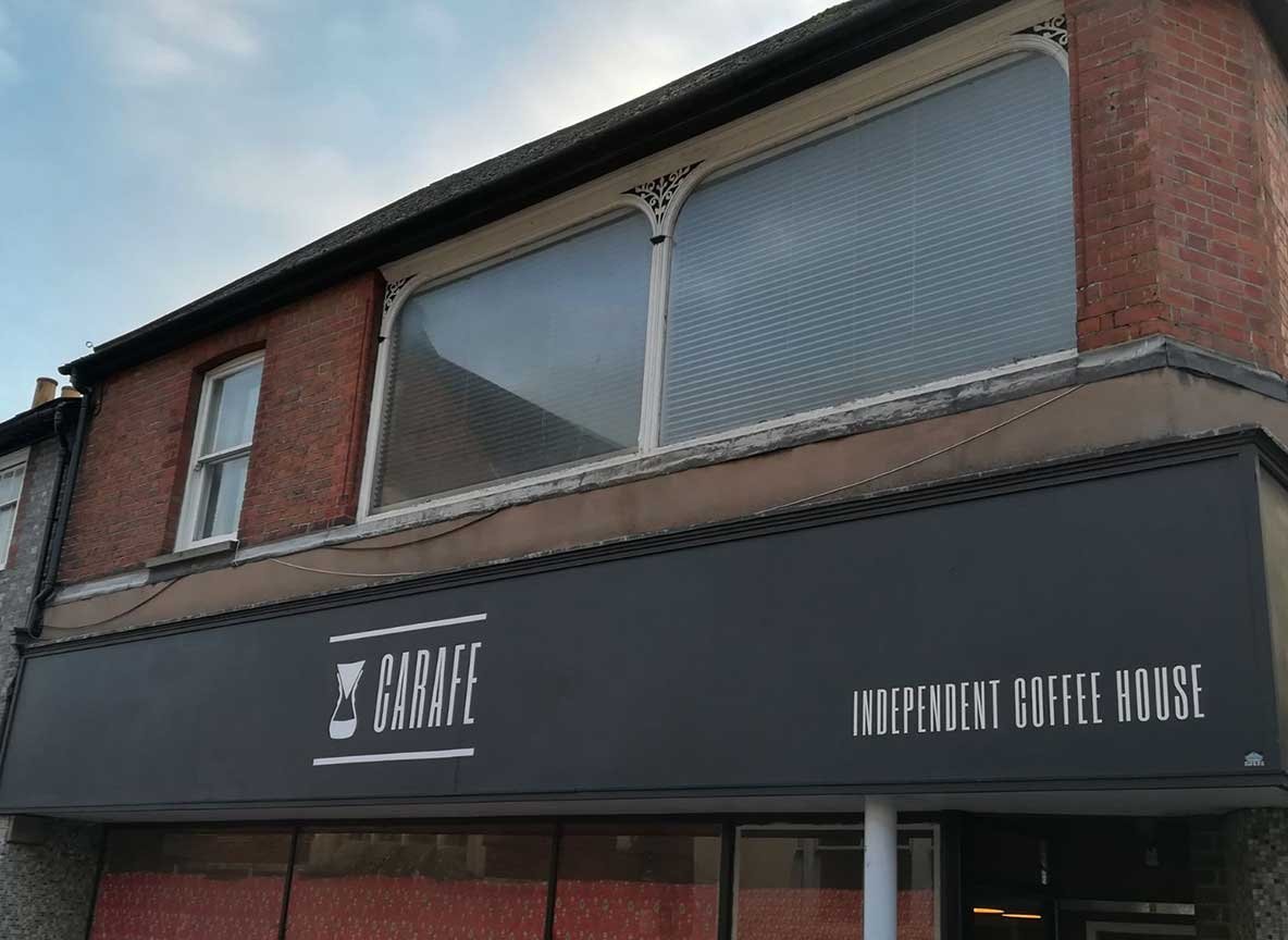 Exterior Signage for CARAFE Independent Coffee House