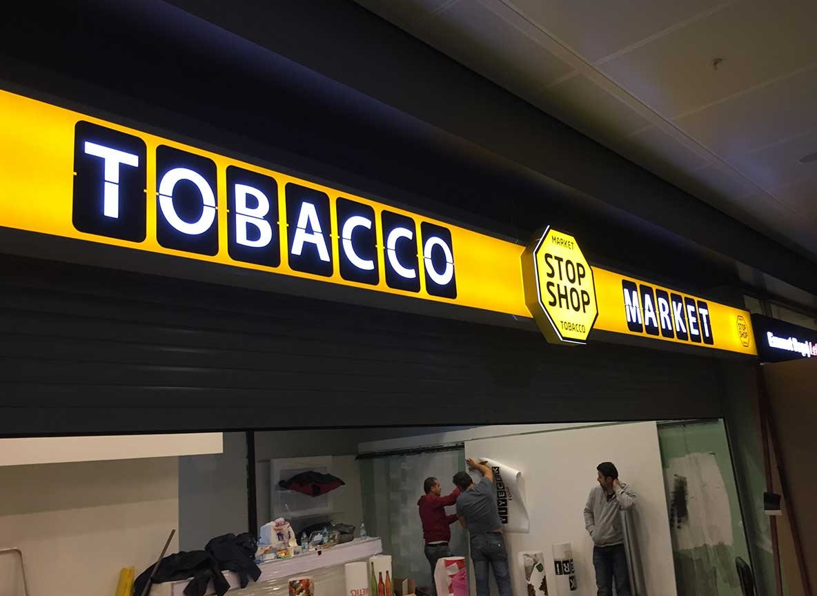 Illuminated Signage Installation for Tobacco Market Stop Shop